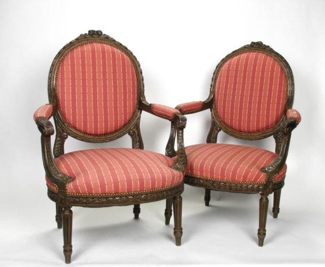 Appraisal: Pair of Louis VXI style Bergere chairs with striped upholstery