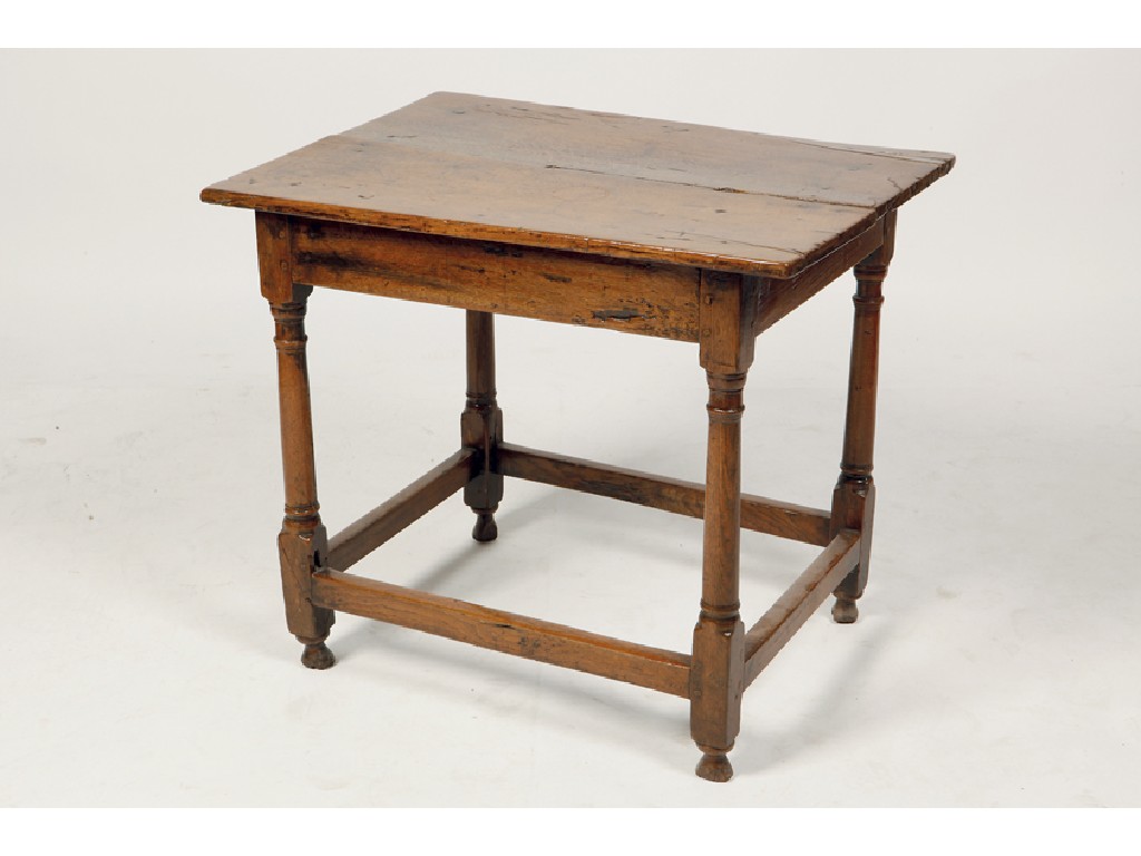 Appraisal: A CHARLES II OAK SIDE TABLE the rectangular two plank