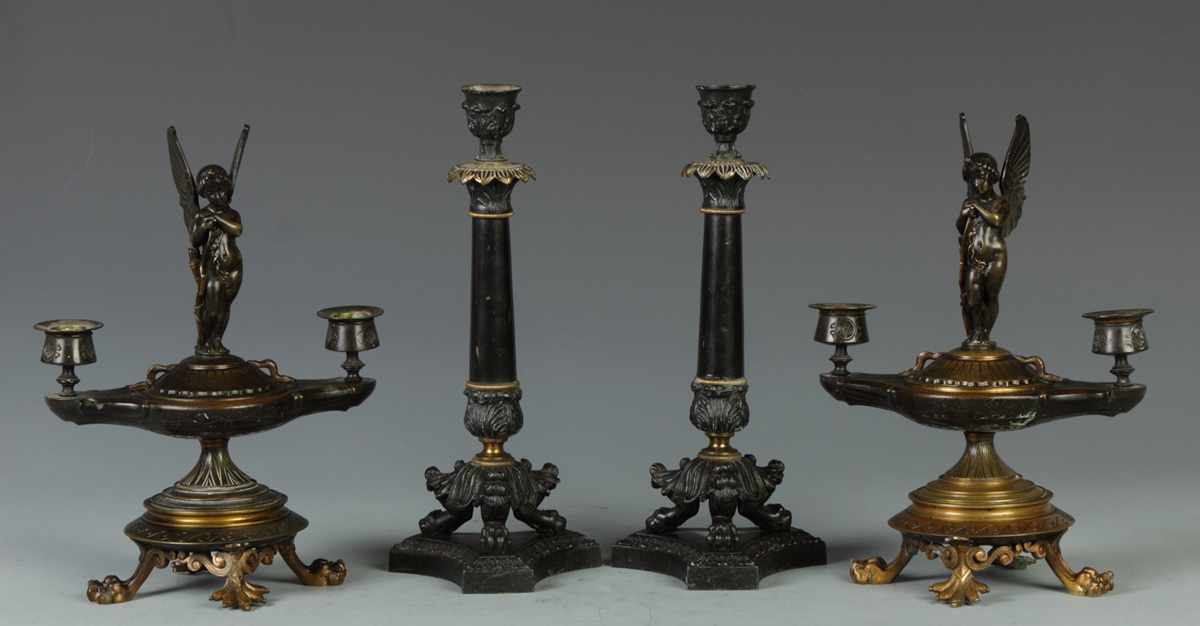 Appraisal: Patinated Metal Empire Style CandlesticksCondition Very good Dimensions Ht ''Provenance