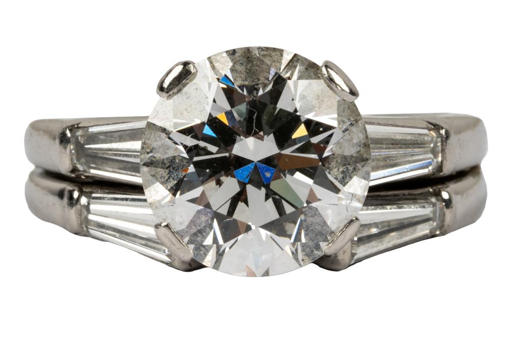 Appraisal: TIFFANY CO DIAMOND PLATINUM RINGcentering one round brilliant cut diamond