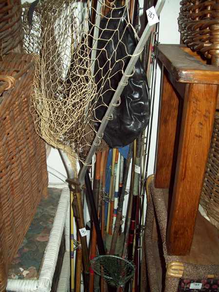 Appraisal: A COLLECTION OF FISHING GEAR CONSISTING OF FISHING RODS AND