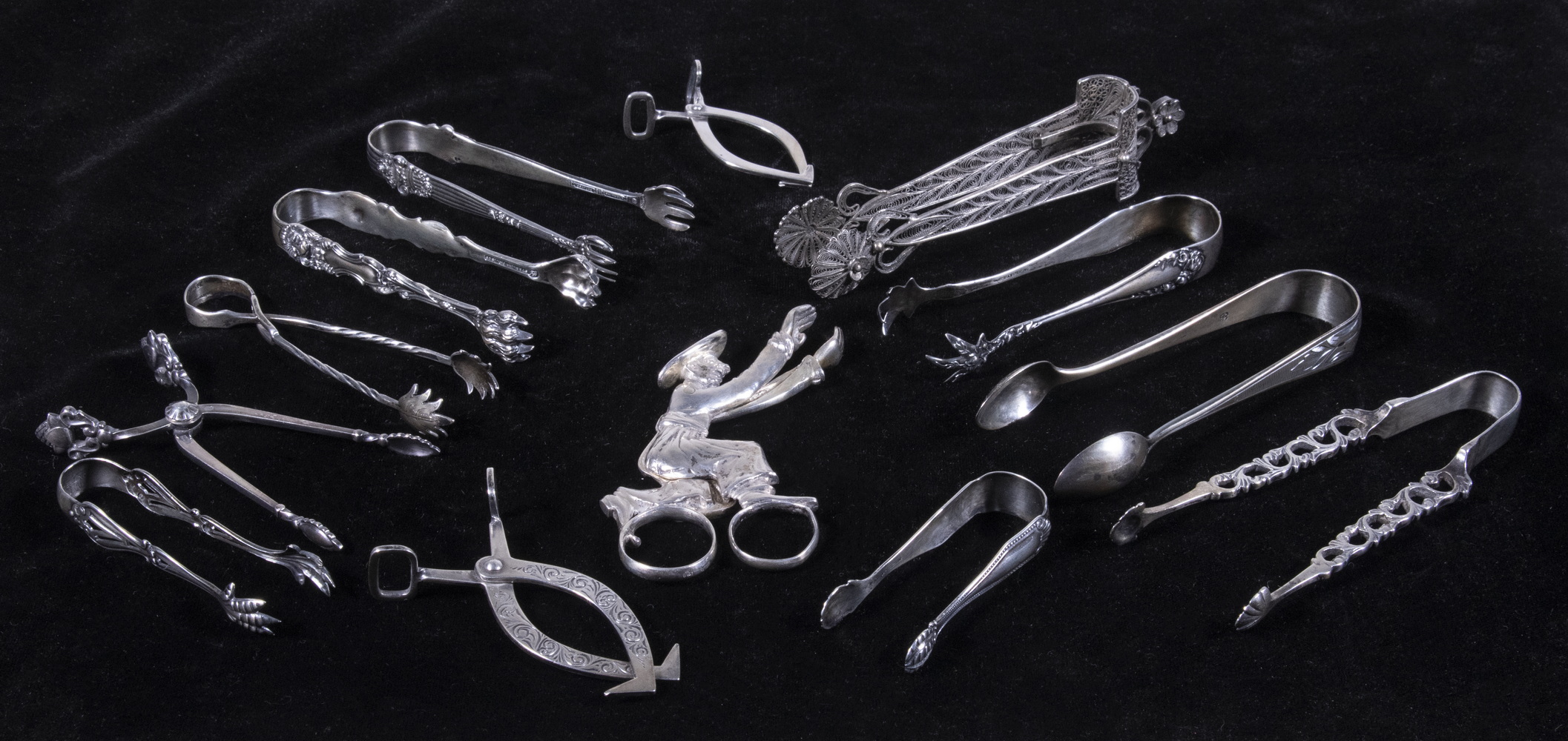 Appraisal: SILVER TONGS COLLECTION Tongs most sterling and most American assorted