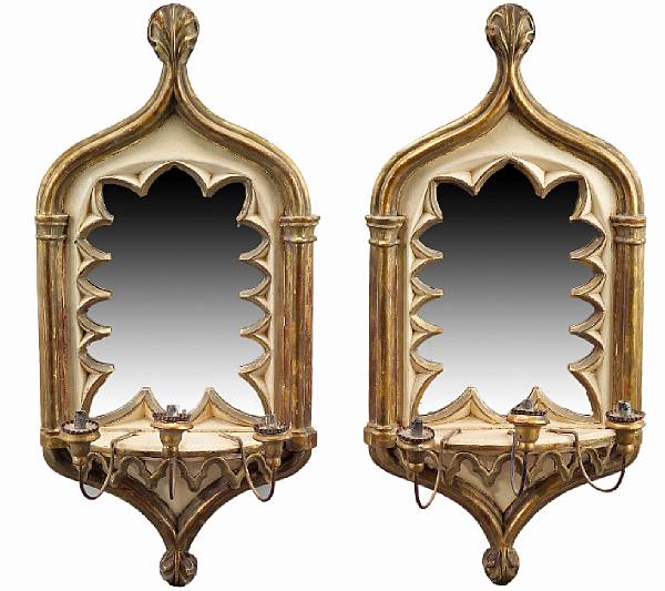 Appraisal: A pair of Continental Gothic style giltwood three light girandoles