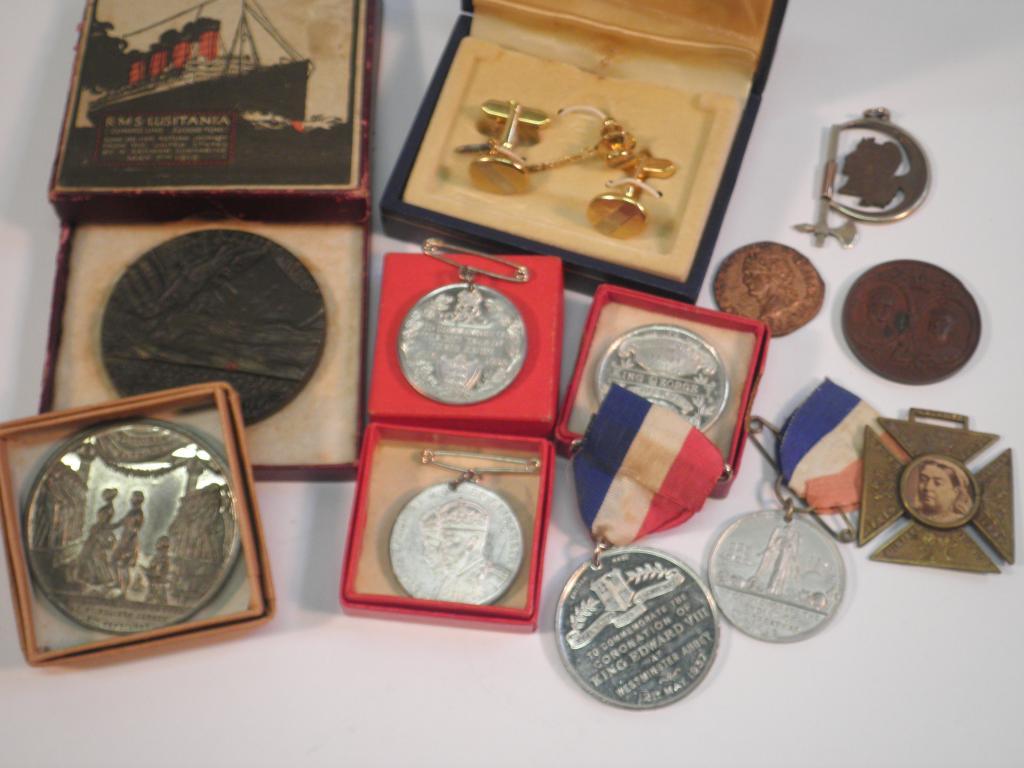 Appraisal: A Lusitania commemorative medallion various other medallions a pendant formed