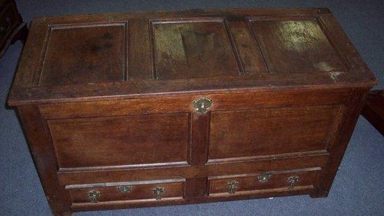 Appraisal: An th Century oak mule chest the hinged triple panel