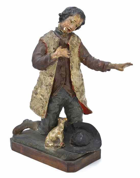 Appraisal: A Continental Papier Mache Figure depicting a kneeling gentleman his