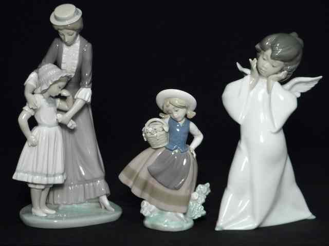 Appraisal: Three Lladro porcelain figurines Includes ''Mime Angel'' Girl with Basket