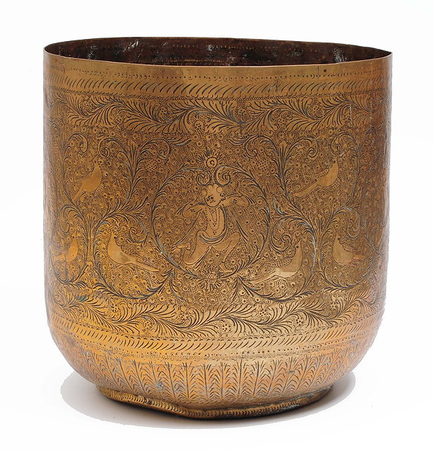 Appraisal: An Indian engraved brass jardinierecirca of cylindrical form cm