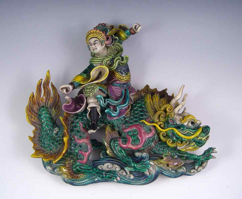 Appraisal: EARLY TH C CHINESE ROOF TILE Polychrome fantasy figure riding