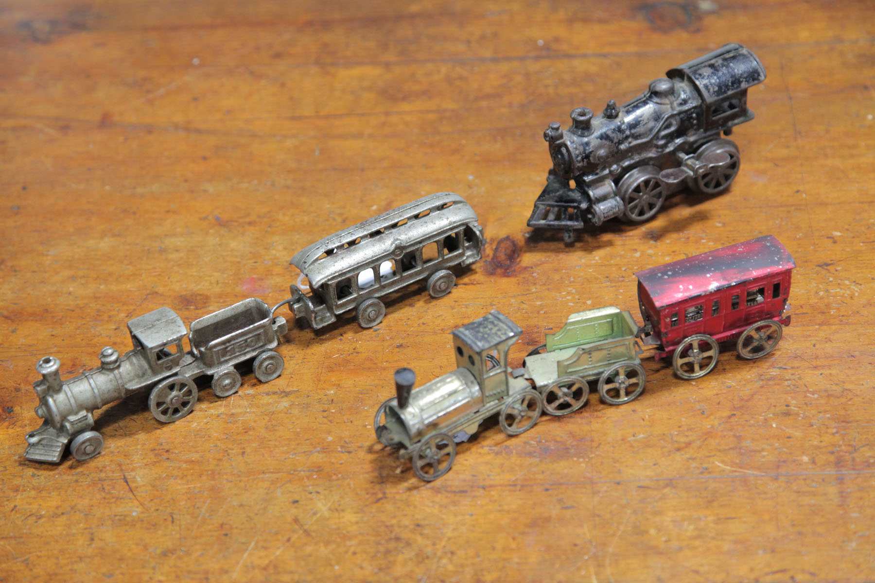 Appraisal: GROUP OF LOCOMOTIVE TOYS American first half of th century