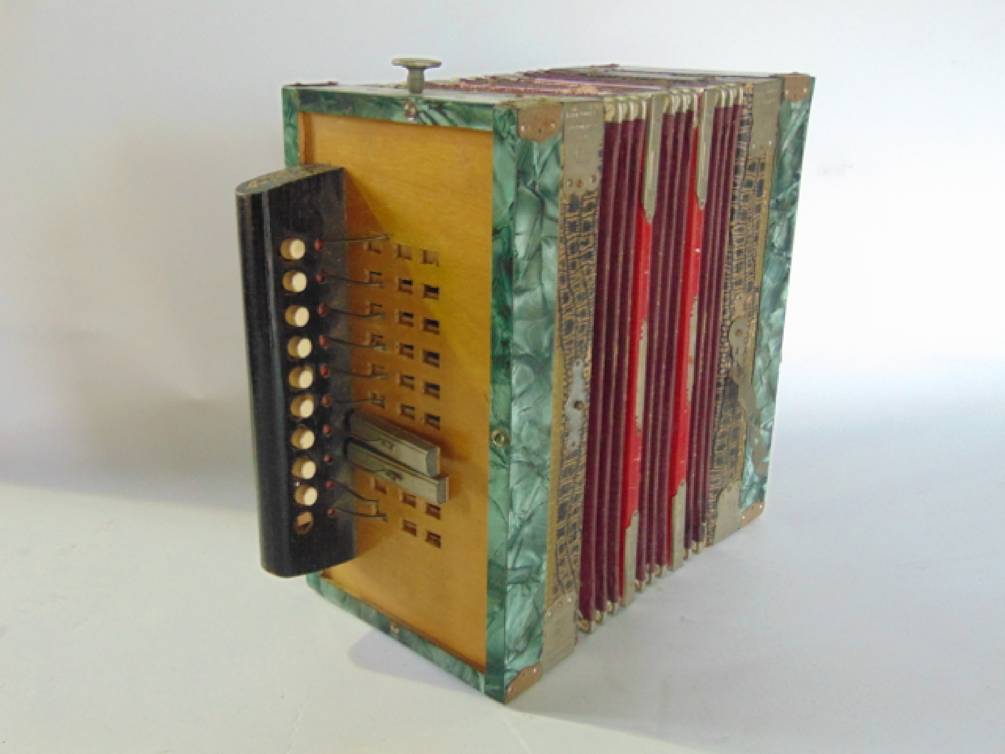 Appraisal: A piano accordion bearing plaque reading Gebr Ludwig Accordion registered