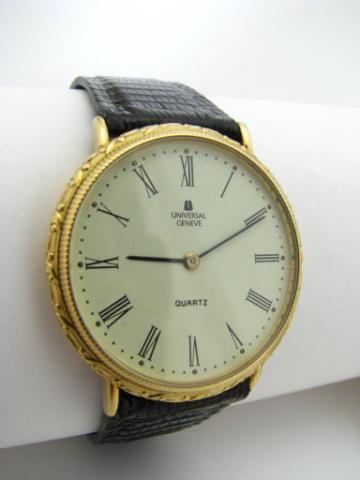 Appraisal: K Yellow Gold Universal Geneve Man's watch with carved case