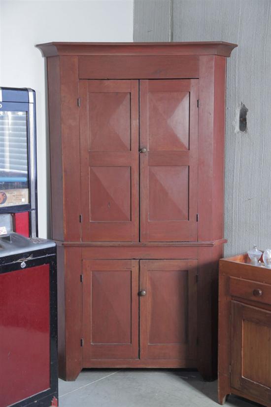 Appraisal: CORNER CUPBOARD Cherry with a red stain and diamond cut