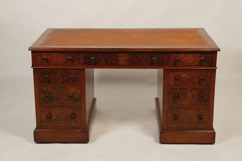 Appraisal: A VICTORIAN WALNUT VENEERED TWIN PEDESTAL WRITING DESK the rectangular