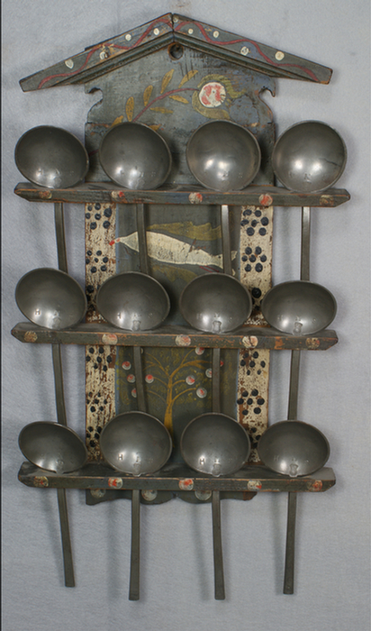 Appraisal: Painted pine Continental spoon rack with pewter spoons of an