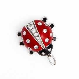 Appraisal: A platinum enamel and eighteen diamond set lady bug charm