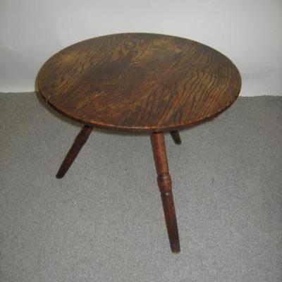 Appraisal: AN OAK CRICKET TABLE early th century the circular top