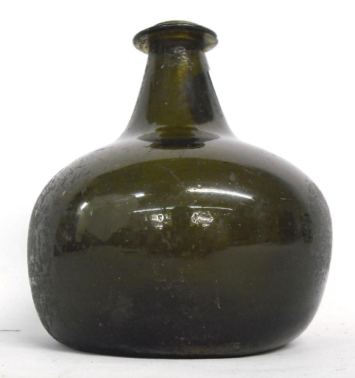 Appraisal: th century green glass onion shape wine bottle possibly Dutch