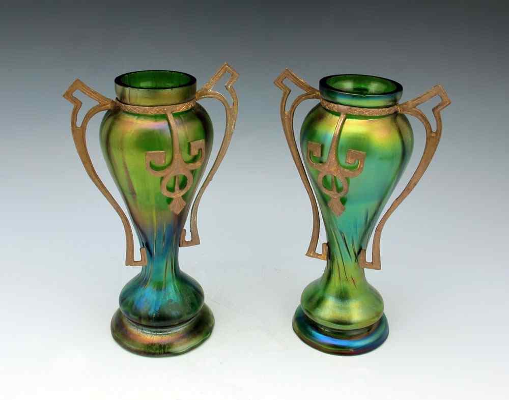 Appraisal: PAIR OF BOHEMIAN ART NOUVEAU IRIDESCENT GLASS VASES Metal mounted