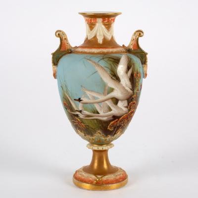 Appraisal: A Royal Worcester oviform vase decorated with swans on a