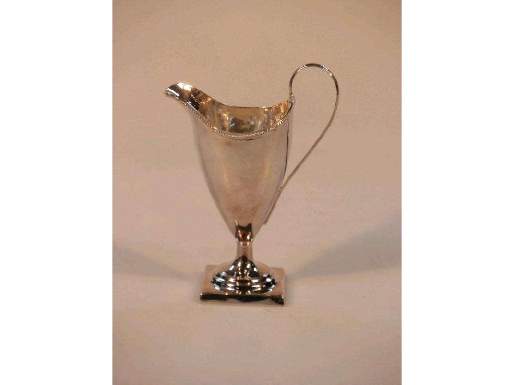 Appraisal: A George III silver helmet cream jug probably by John