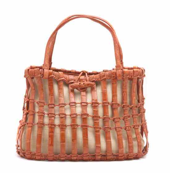 Appraisal: A Nancy Gonzalez Orange Crocodile Woven Bag with natural linen