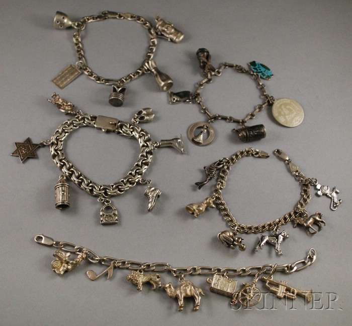 Appraisal: Five Sterling Silver Charm Bracelets one Mexican with a mix