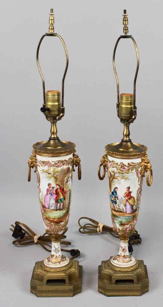 Appraisal: PAIR OF GILT MOUNTED SEVRES STYLE LAMPS with stylized applied