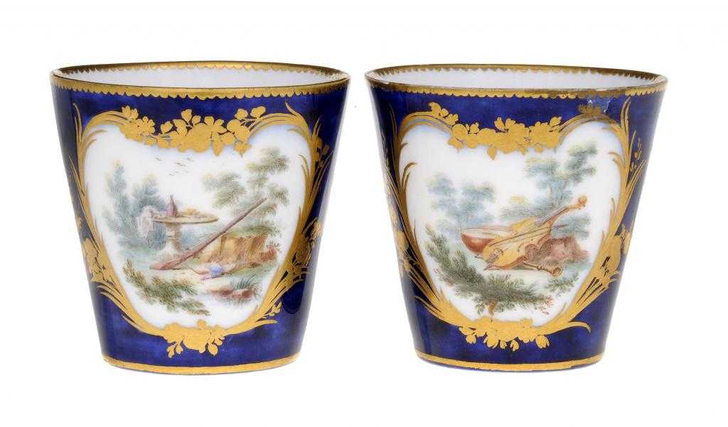 Appraisal: A PAIR OF VINCENNES BLEU LAPIS BEAKERS finely painted to