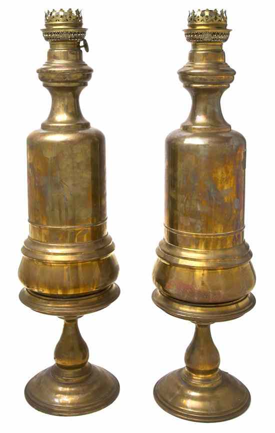 Appraisal: A Pair of Continental Brass Canister Lamps each of cylindrical