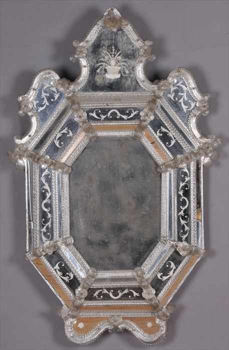 Appraisal: VENETIAN ROCOCO-STYLE ETCHED GLASS MIRROR The oblong octagonal beveled plate