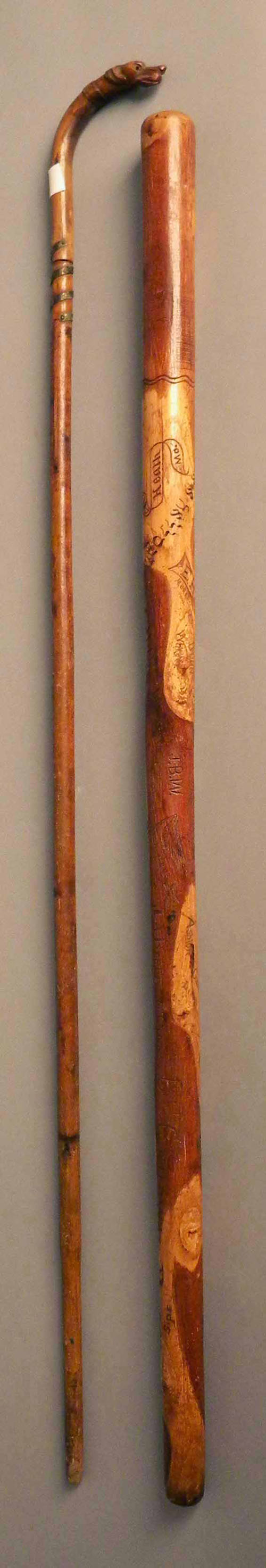 Appraisal: Carved cane with dog head grip late th c together