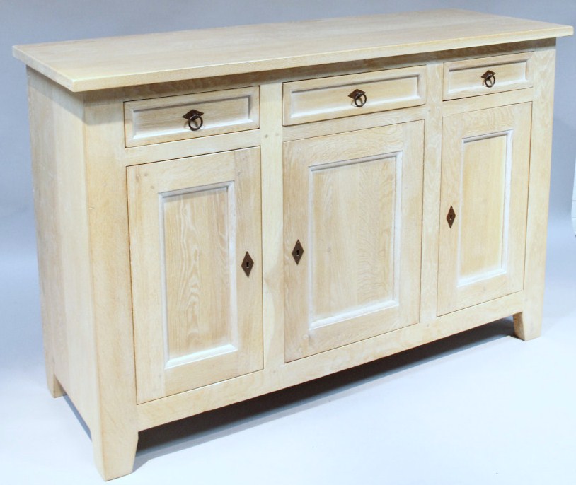 Appraisal: A modern limed oak finish sideboard the overhanging rectangular top