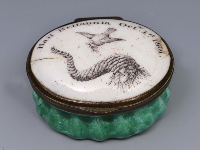 Appraisal: A GEORGIAN OVAL ENAMELLED PATCH BOX with the Dove of