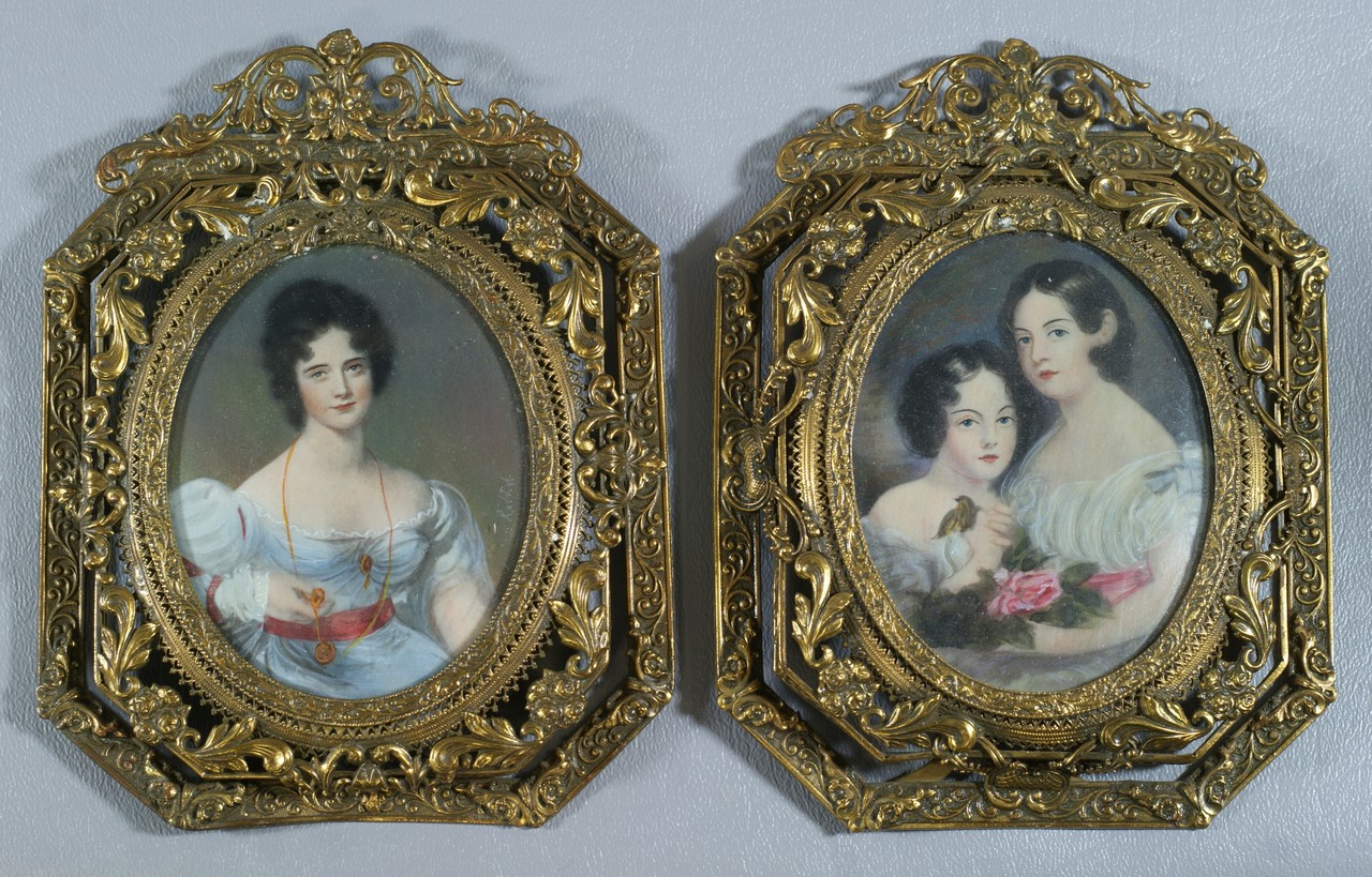 Appraisal: oval HP portraits on ivory woman holding rose sisters holding