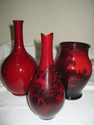 Appraisal: A GROUP OF THREE ROYAL DOULTON FLAMBE WARE VASES comprising