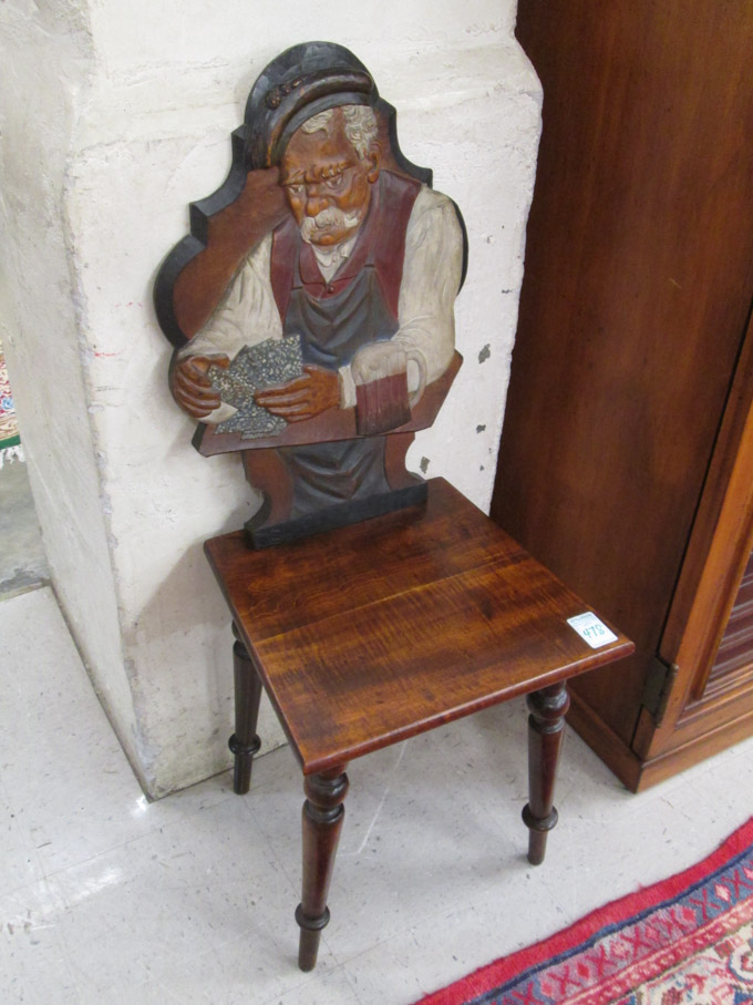 Appraisal: A FIGURAL CARVED TAVERN CHAIR Bavaria early th century the