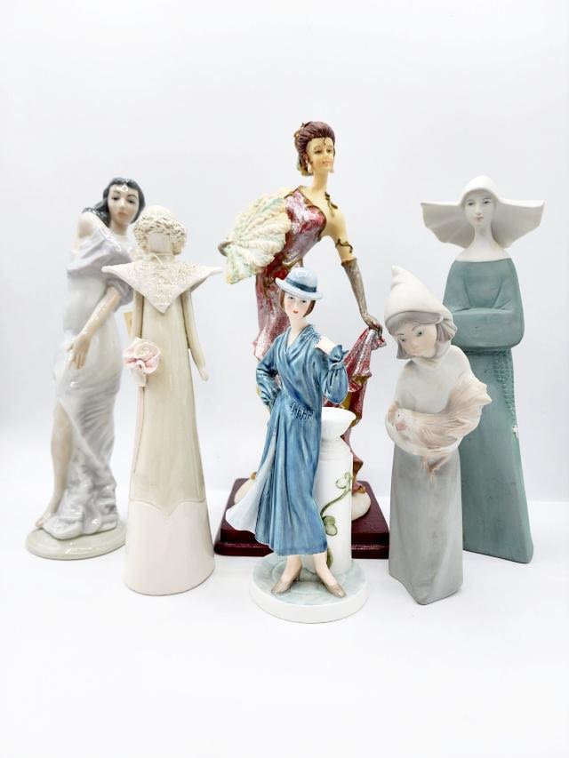 Appraisal: Group of figurines including a matte finish Lladro Girl with