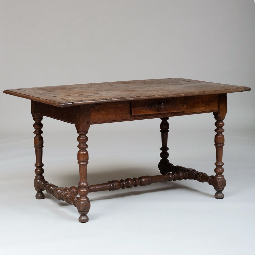 Appraisal: Flemish Baroque Style Stained Oak Table Fitted with one drawer