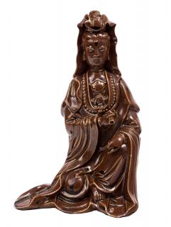 Appraisal: A RARE DEHUA BROWN-GLAZED FIGURE OF GUANYIN QING DYNASTY TH