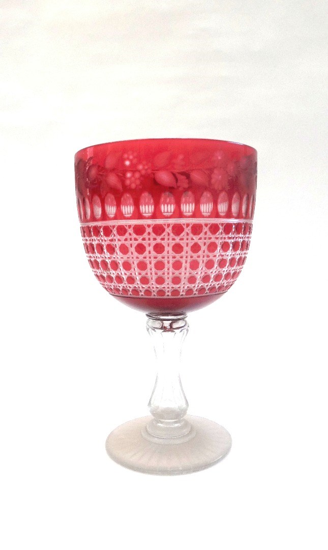 Appraisal: A Victorian cranberry cut glass pedestal vase with rose engraved