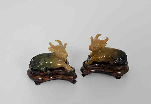 Appraisal: Chinese Hardstone Goats th century A pair of carved hardstone