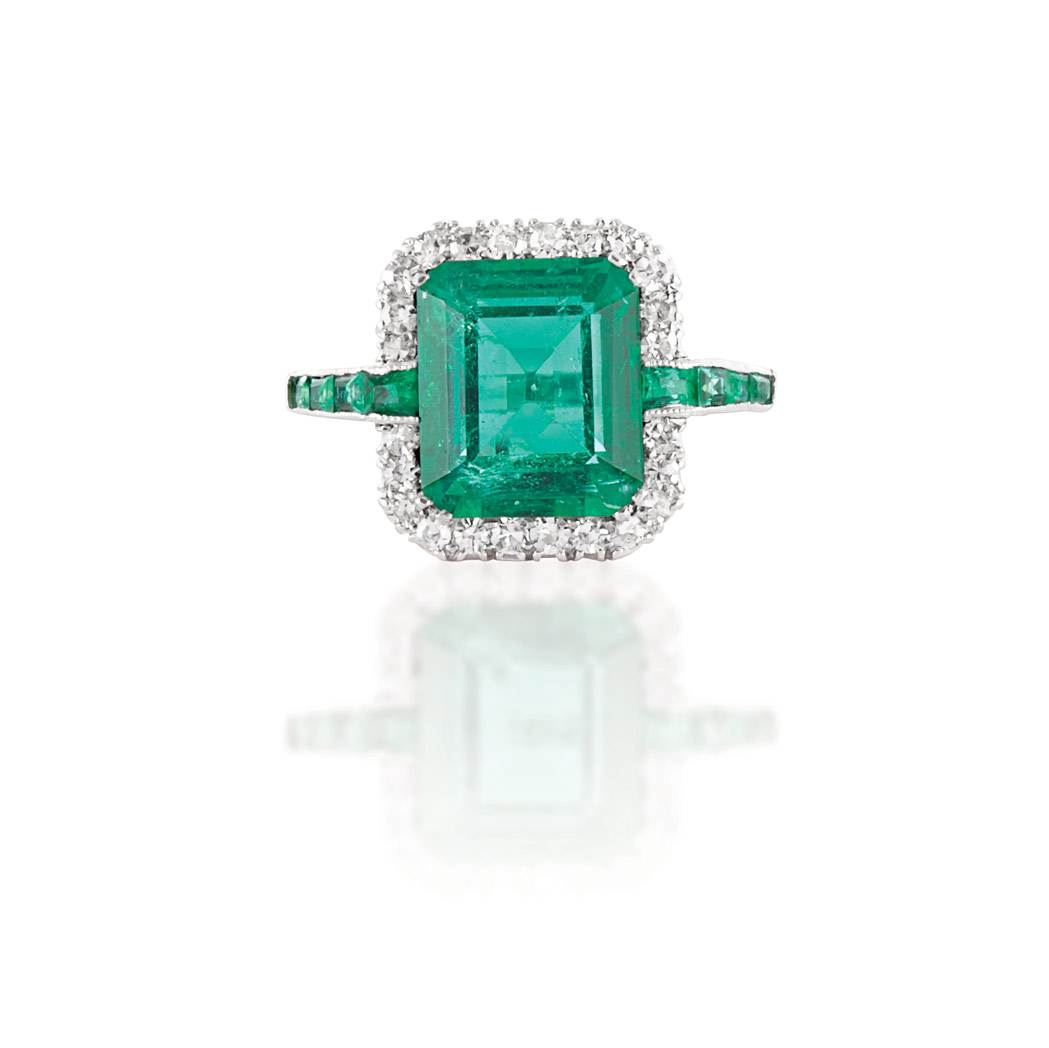 Appraisal: Platinum Emerald and Diamond Ring Centering one emerald-cut emerald approximately