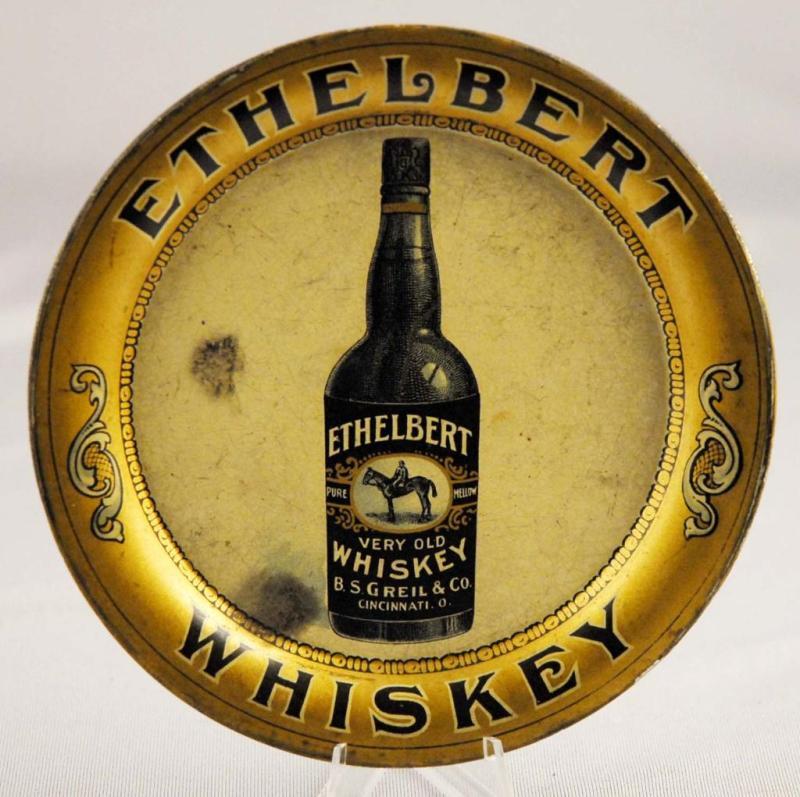 Appraisal: Tin Ethelbert Whiskey Advertising Tray Description Rare tray with two