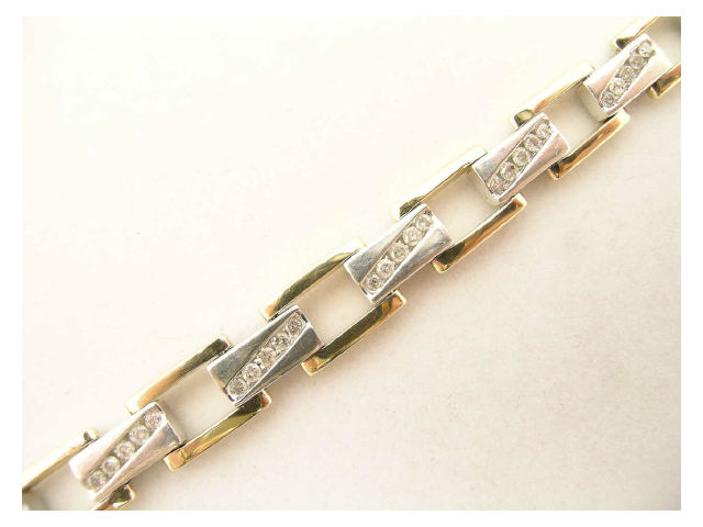 Appraisal: K gold and sterling diamond bracelet alternating box links with