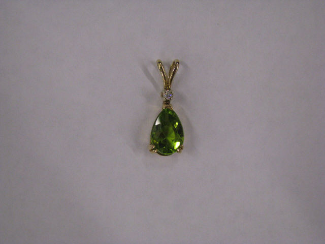 Appraisal: Peridot Diamond Pendant pear shaped gem in k yellow gold