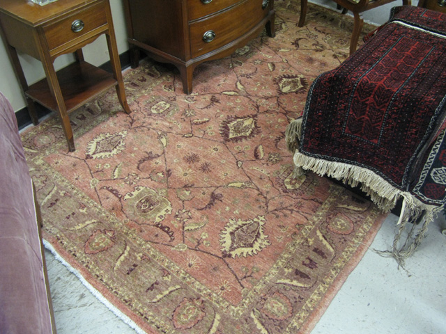 Appraisal: HAND KNOTTED ORIENTAL CARPET Pakistani Persian overall floral tracery on