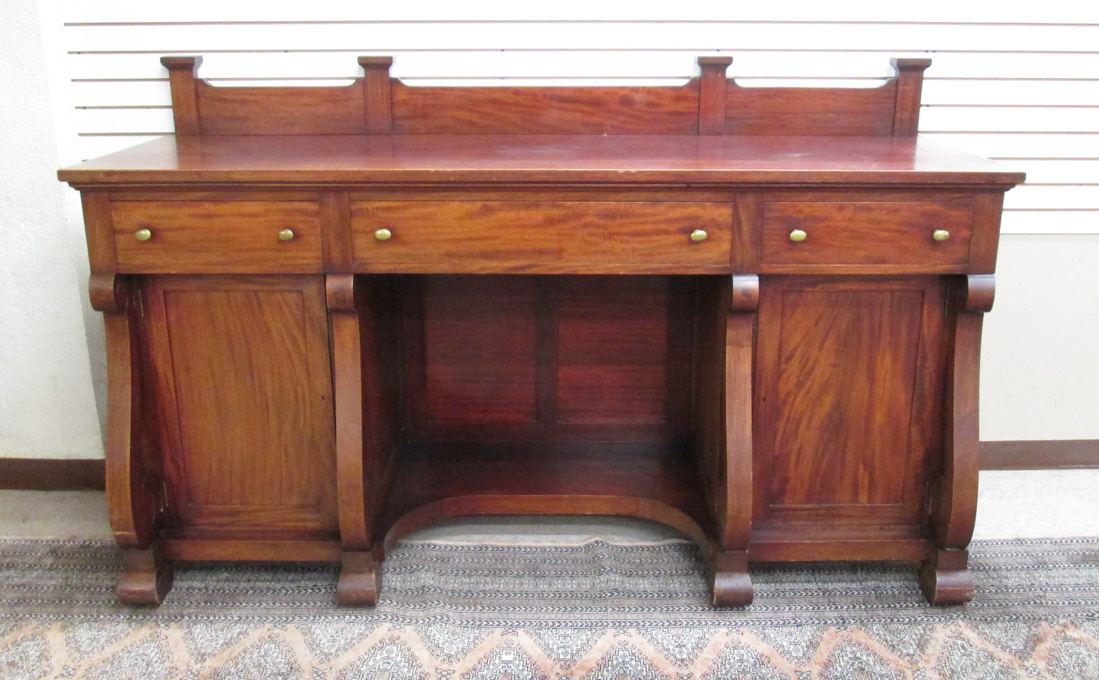 Appraisal: A LARGE EMPIRE REVIVAL MAHOGANY SIDEBOARD American early th century