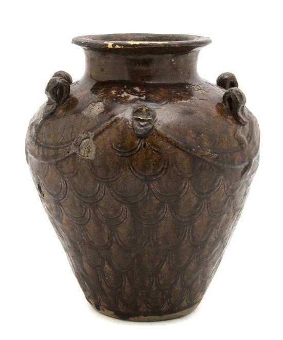 Appraisal: Southeast Asian Brown Glazed Dragon Vase of typical baluster form