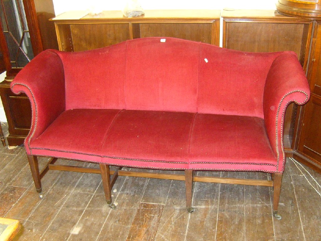 Appraisal: A Georgian -seat camel back sofa with scrolled arms and